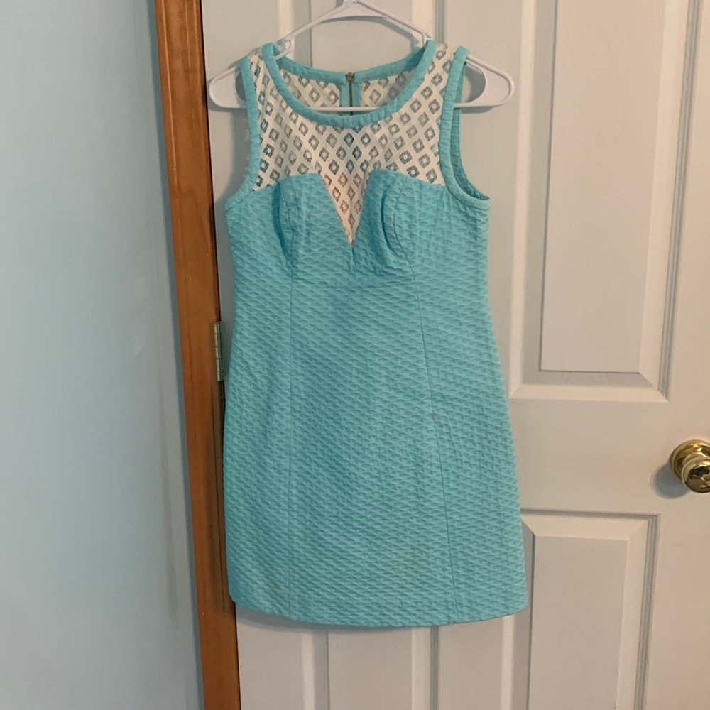 Only worn twice and has a small stain. Dry cleaned